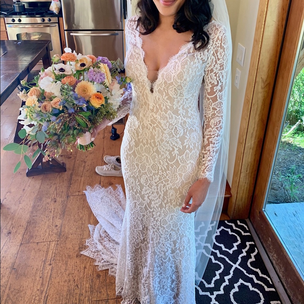 BHLDN lace wedding gown long sleeve button back